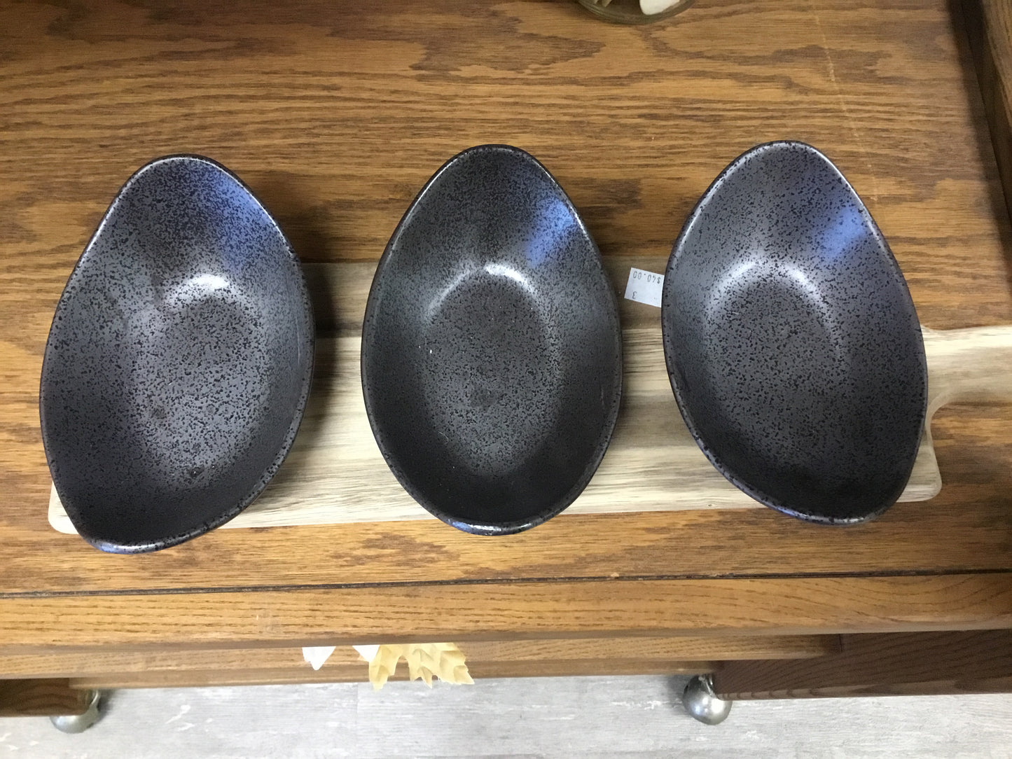 Ceramic Grey U-Boat dishes on a Cutting Board