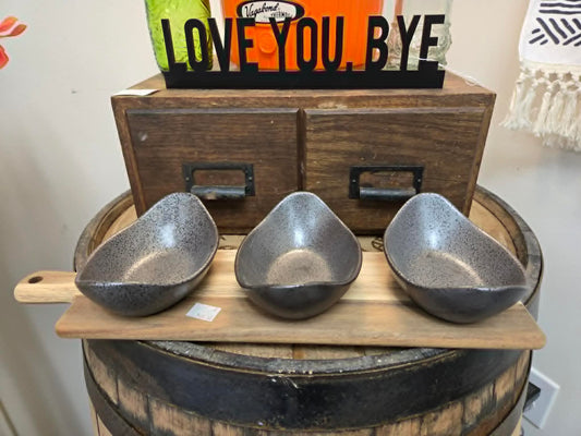 Ceramic Grey U-Boat dishes on a Cutting Board